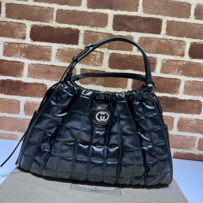 G*u*i top handle bags